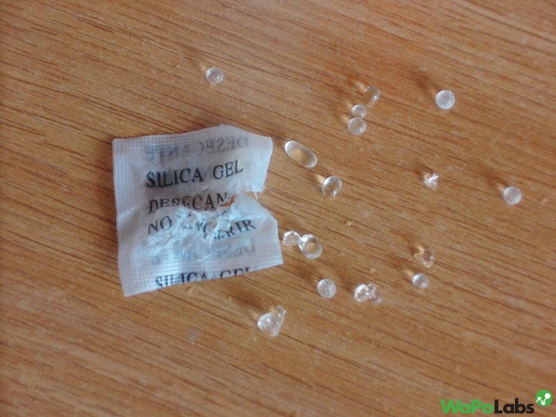 Use Silica Gel to dry the water