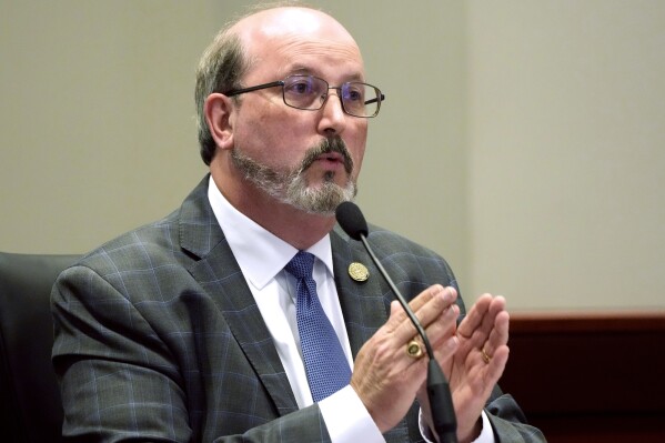 Mississippi Department of Human Services Executive Director Bob Anderson addresses members of the Mississippi Joint Legislative Budget Committee during his agency's budget presentation, Friday, Sept. 29, 2023, in Jackson, Miss. (AP Photo/Rogelio V. Solis)