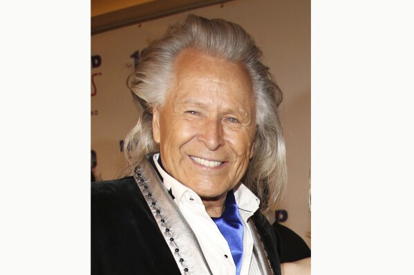 FILE - Peter Nygard attends the 24th Night of 100 Stars Oscars Viewing Gala on March 2, 2014, in Beverly Hills, Calif. Former Canadian fashion mogul Nygard pleaded not guilty Thursday, Sept. 21, 2023, to all charges against him in his Toronto sexual assault case, as jury selection for his trial got underway. (Photo by Annie I. Bang /Invision/AP, File)